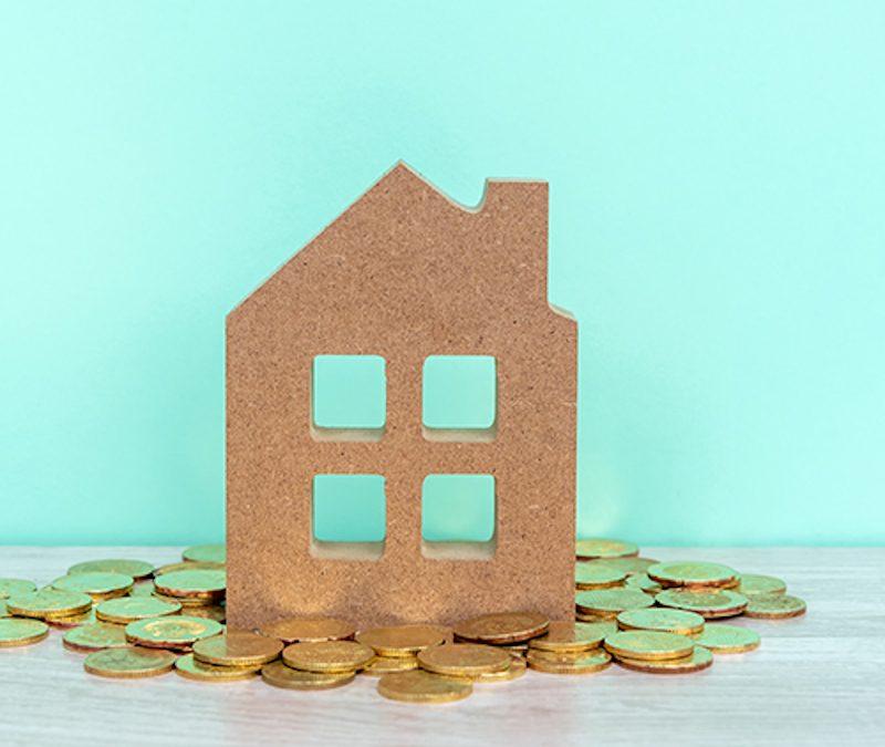 House on top of coins